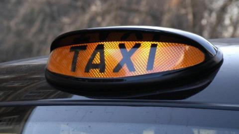 A taxi sign