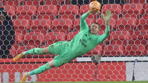 Ethan Horvath saves a penalty