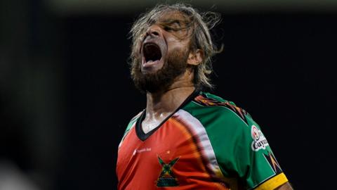 Guyana Amazon Warriors' Imran Tahir celebrates a wicket