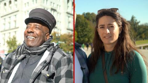 One a man laughing wearing a scarf and a woman with a confused expression