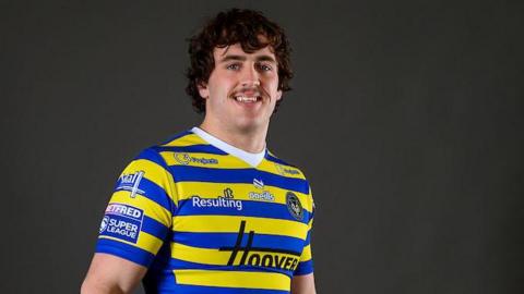 A grinning Max Wood in his Warrington kit.