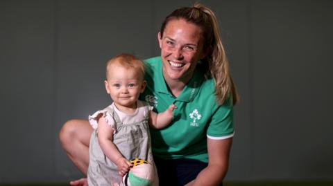 Ashleigh Orchard and her daughter, Arabella, who will be in Paris to cheer on Ireland