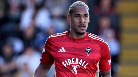 Haji Mnoga in action for Salford in their play-off semi-final first-leg win at Grimsby