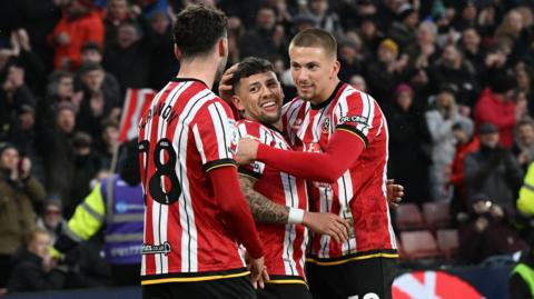 Sheffield United celebrate Gustavo Hamer's opening goal against Portsmouth