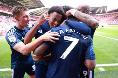 Leicester players celebrate with Abdul Fatawu
