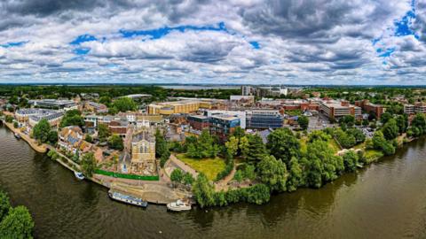 Aerial view of Staines-upon-Thames, a town on the left bank of the River Thames in Surrey, England.