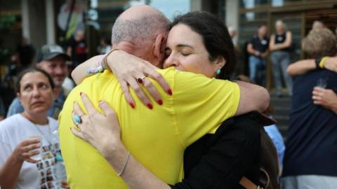 Itzik Horn, father of kidnapped Eitan Horn (L), celebrates after a peace deal is announced at Hostages Square in Tel Aviv, Israel, 09 October 2025