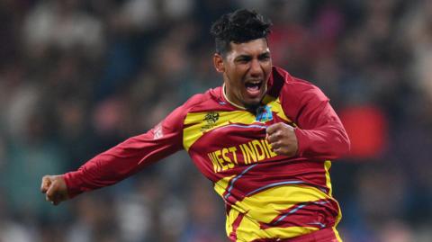 West Indies spinner Gudakesh Motie celebrates taking a wicket
