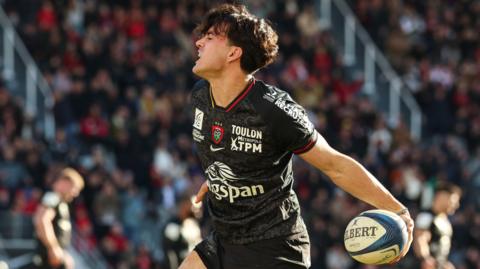 Marius Domon celebrates