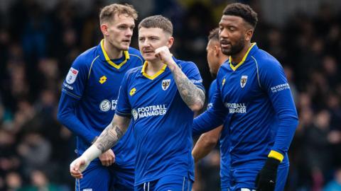 James Tilley of AFC Wimbledon celebrates his goal in the 3-1 win over Bradford