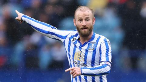 Barry Bannan, Sheffield Wednesday, makes a pointing gesture