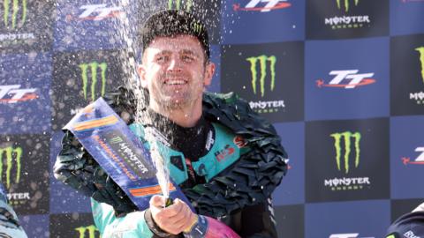 Michael Dunlop celebrates at the 2023 Isle of Man TT