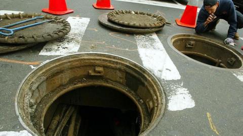 An official inspects manhole covers near Empire State Building (File picture)