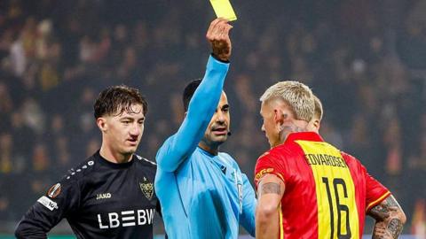 VfB Stuttgart midfielder Angelo Stiller (left) and Go Ahead Eagles striker Victor Edvardsen talk in a heated manner during the Europa League game between their sides