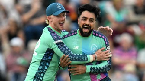 Rashid Khan and Jordan Cox celebrate a wicket for Oval Invincibles