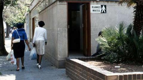 Building with white-segregation sign