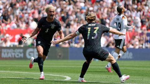 Antonee Robinson of the United States football team celebrates after scoring a goal