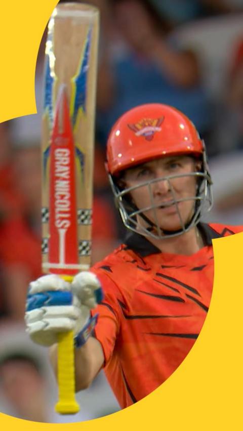 Harry Brook holds his bat up straight after hitting a half-century