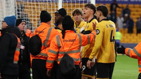 Jorgen Strand Larsen speaks to fans at the final whistle.