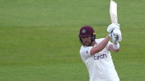 Josh Cobb smites a boundary against Hampshire in the County Championship in 2022