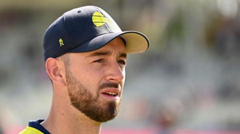 Hampshire's James Vince looks on 