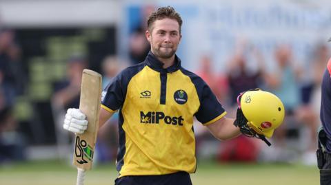 Eddie Byrom of Glamorgan celebrates his century 