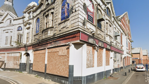 The Picture House in Castleford, a derelict boarded-up building dating from the 1920s.