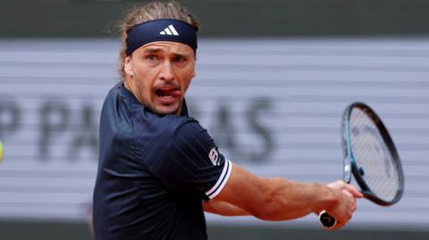 Alexander Zverev hits a backhand