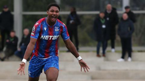 Jemiah Umolu celebrates scoring for Crystal Palace's Under-21 side