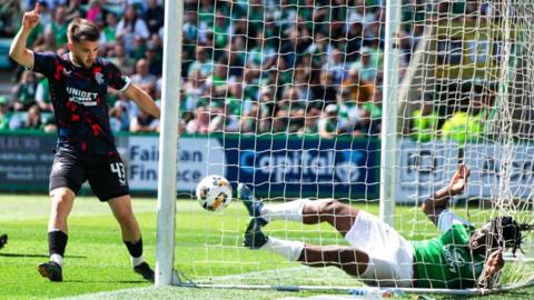 Rangers' Nicolas Raskin and Hibernian's Rocky Bushiri