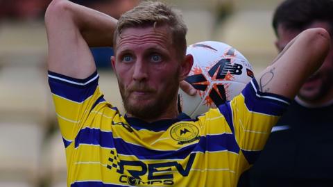 Dean Moxey in action for Torquay United