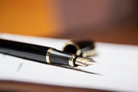 General image of fountain pen on contract paper