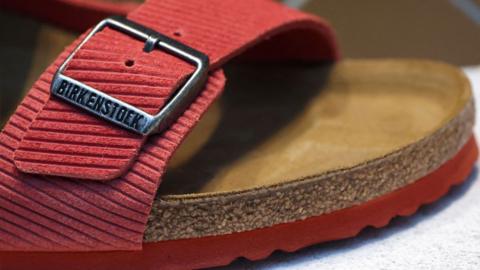 A red Birkenstock sandal