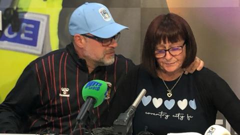 Clint and Louise Slater at a press conference