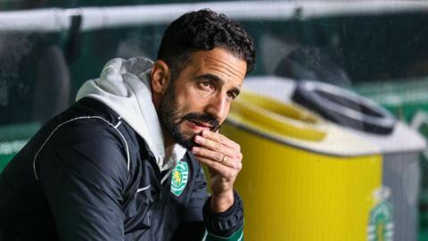 Head coach Ruben Amorim of Sporting sits in the dugout