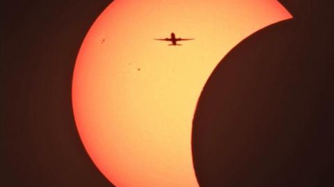 Plane crossing the Sun during the partial eclipse - taken from Beenham in West Berkshire.