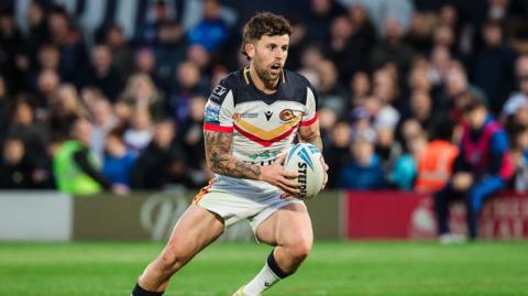 Toby Sexton of Catalans in action.