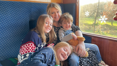 A picture of Kate Dyson and her three children.