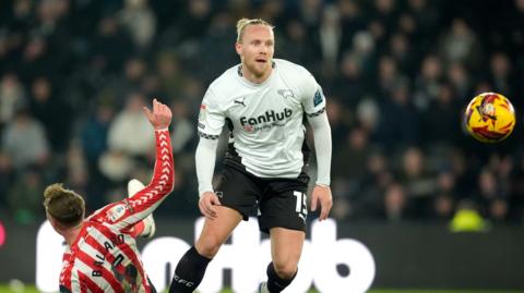  Lars-Jorgen Salvesen in action for Derby