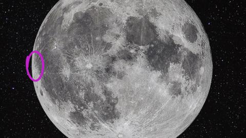 the moon with a circle round the einstein crater
