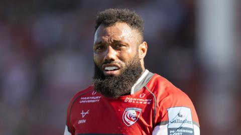 Jamal Ford-Robinson standing on the field during a match