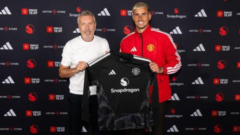 Karl Darlow of Manchester United poses after signing for the club at Carrington Training Ground