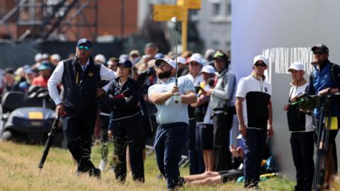 England's Tyrrell Hatton plays out of the rough on the 18th hole during the second round of the 51st Open Championship at Royal Liverpool in Hoylake July 2023.