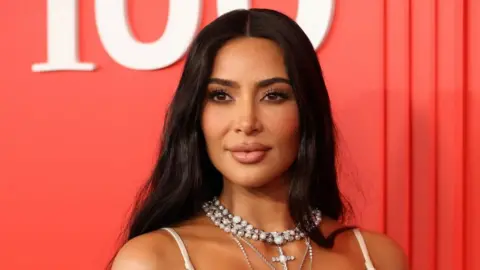 Kim Kardashian poses on the red carpet as she arrives for the Time Magazine 100 gala celebrating their list of the 100 Most Influential People in the world in New York City, New York, U.S., April 26, 2023.
