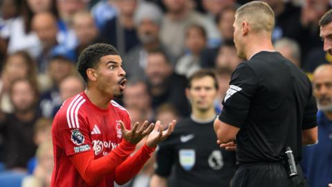 Morgan Gibbs-White protests after being sent off against Brighton