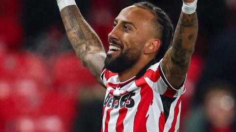 Sorba Thomas celebrates goal