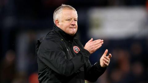 Chris Wilder, Manager of Sheffield United, applauds the fans after the Premier League match between Luton Town and Sheffield United at Kenilworth Road 