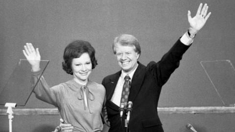 Jimmy and Rosalynn Carter wave as he accepts the Democratic presidential nomination in 1976.