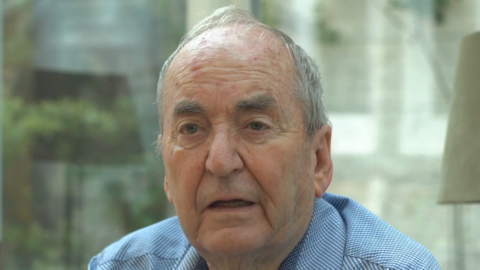 Andrew Quicke, an older man with grey hair and wearing a blue shirt