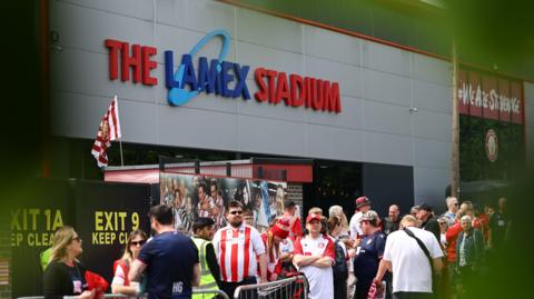 Stevenage fans outside the Lamex Stadium